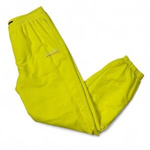 Vintage HUF neon yellow mesh lined swishy joggers